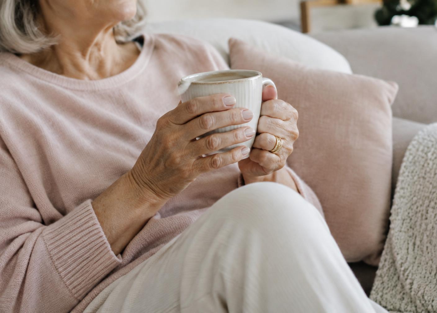 Hands holding a warm mug